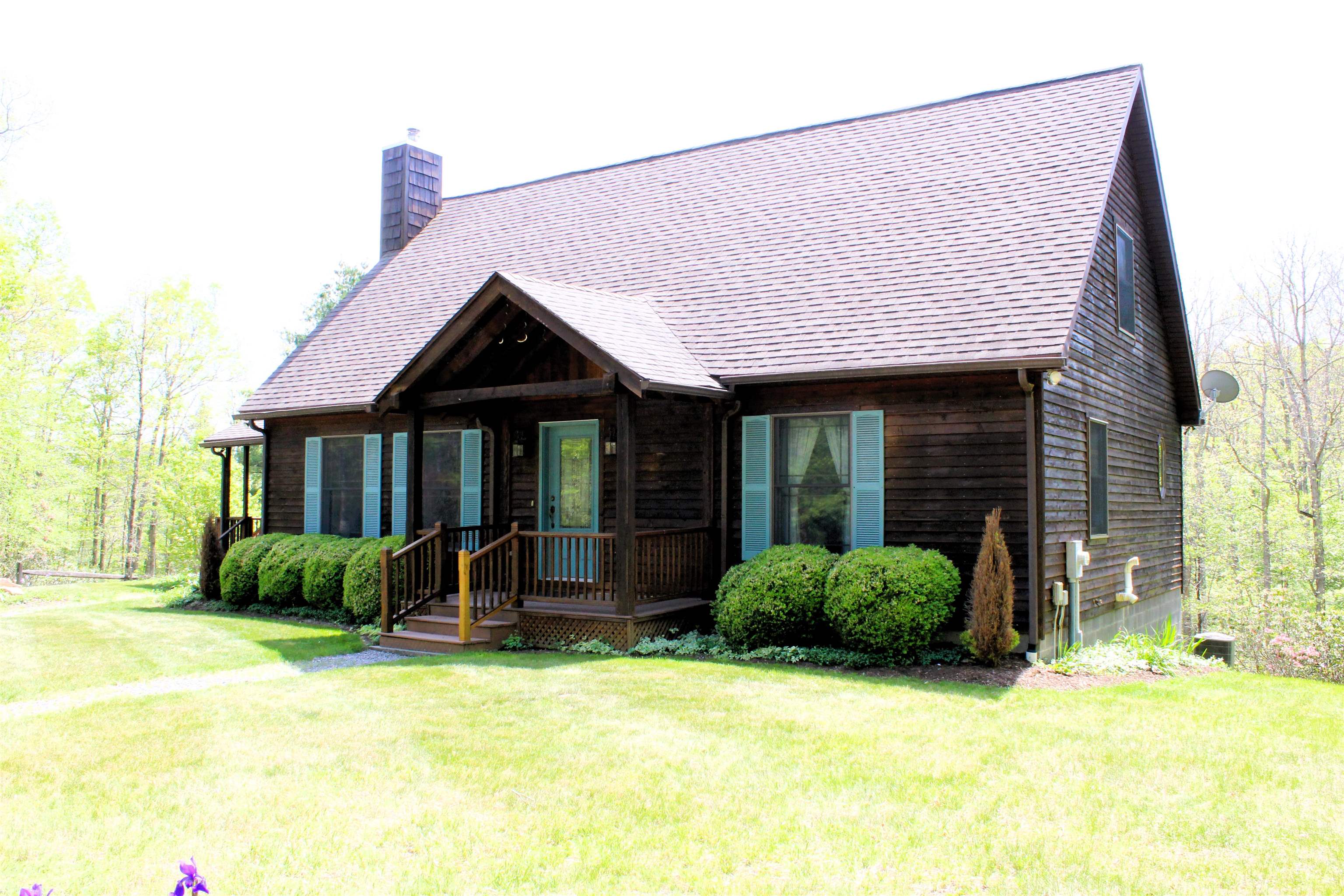 625 Hummingbird Lane Monterey, VA 24465 - Photo 41 of 65 a front view of a house with garden