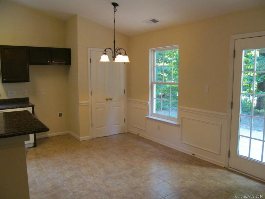 5209 Javitz Road Charlotte, NC 28216 - Photo 3 of 10 a view of an empty room with a window