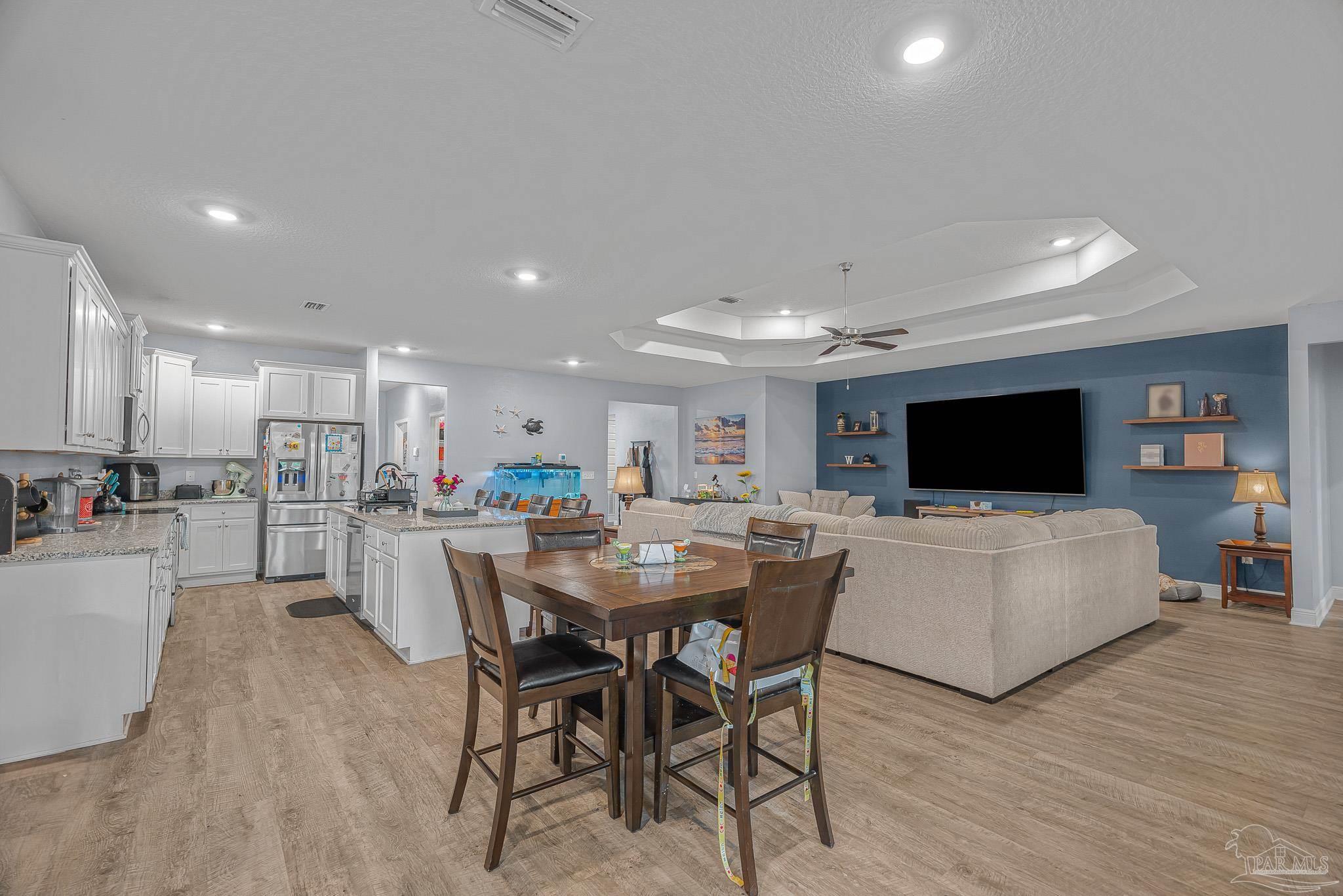 355 Cayden Way Cantonment, FL 32533 - Photo 16 of 61 a view of a dining room with furniture