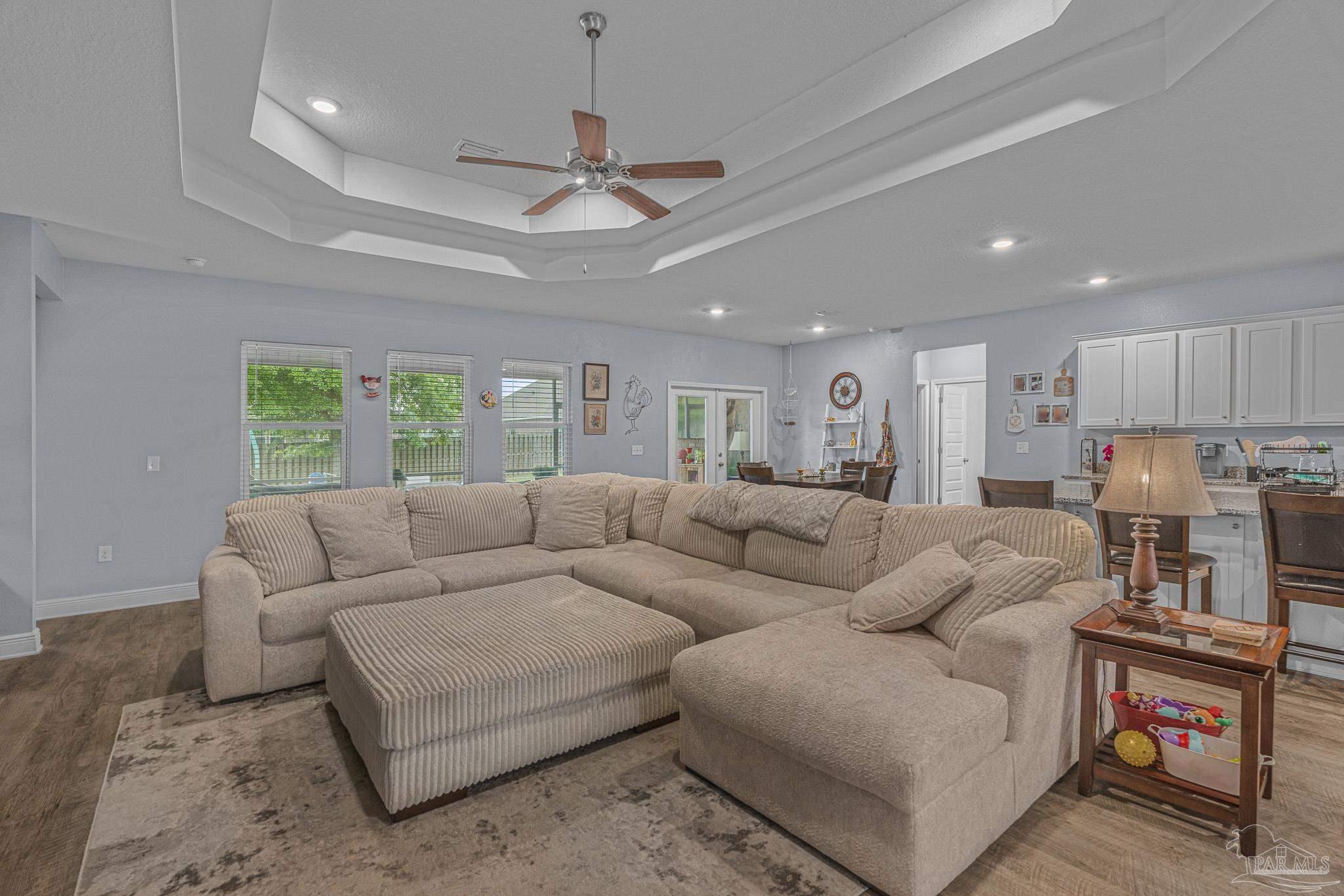 355 Cayden Way Cantonment, FL 32533 - Photo 22 of 61 a living room with furniture and a window