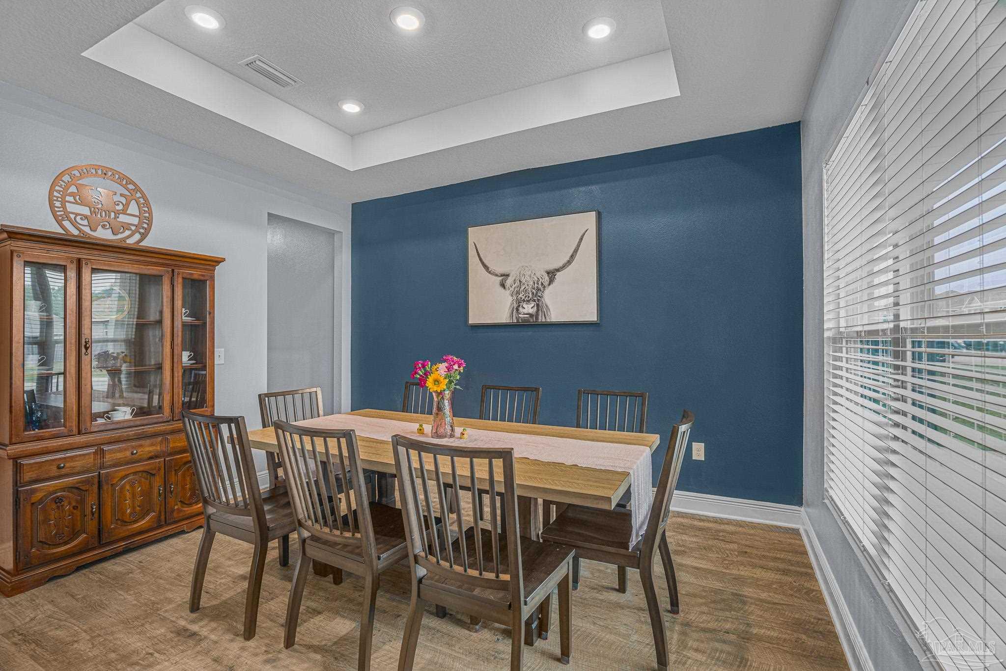 355 Cayden Way Cantonment, FL 32533 - Photo 28 of 61 a view of a dining room with furniture window and wooden floor