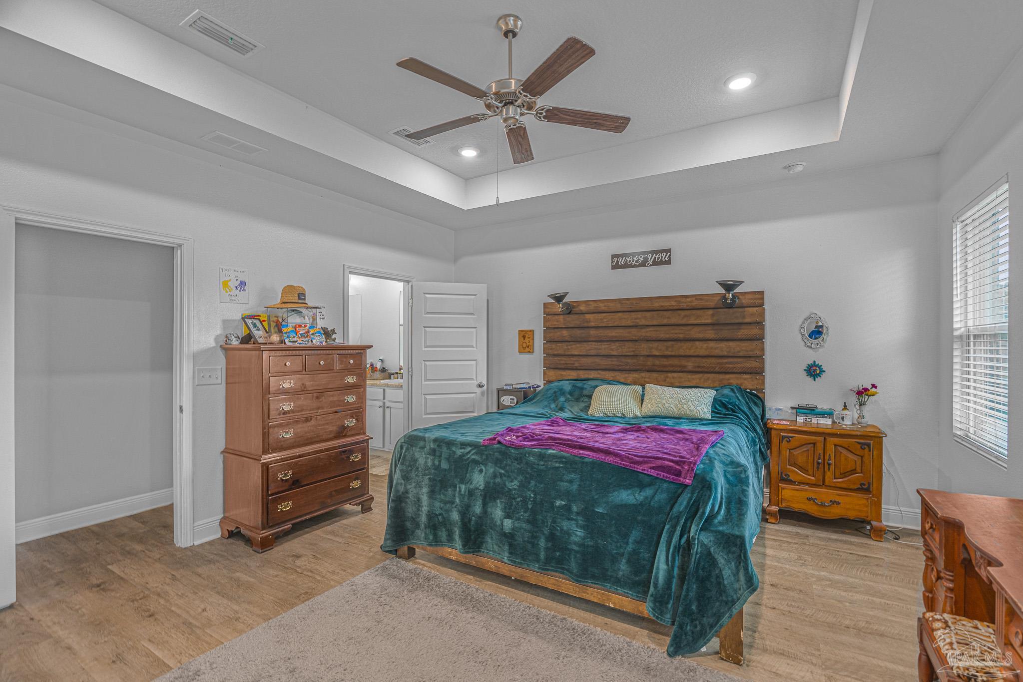 355 Cayden Way Cantonment, FL 32533 - Photo 32 of 61 a bedroom with furniture and a bed