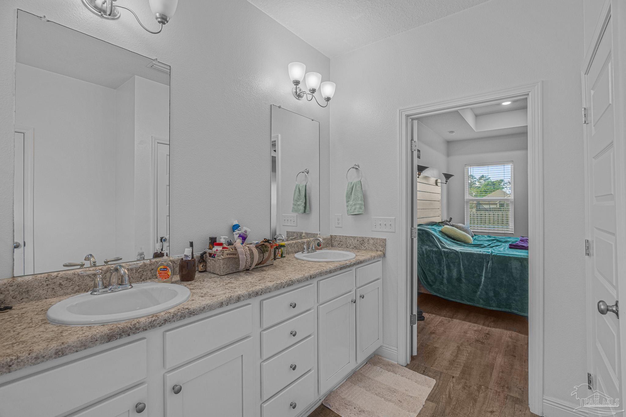 355 Cayden Way Cantonment, FL 32533 - Photo 35 of 61 a bathroom with double sink and a mirror