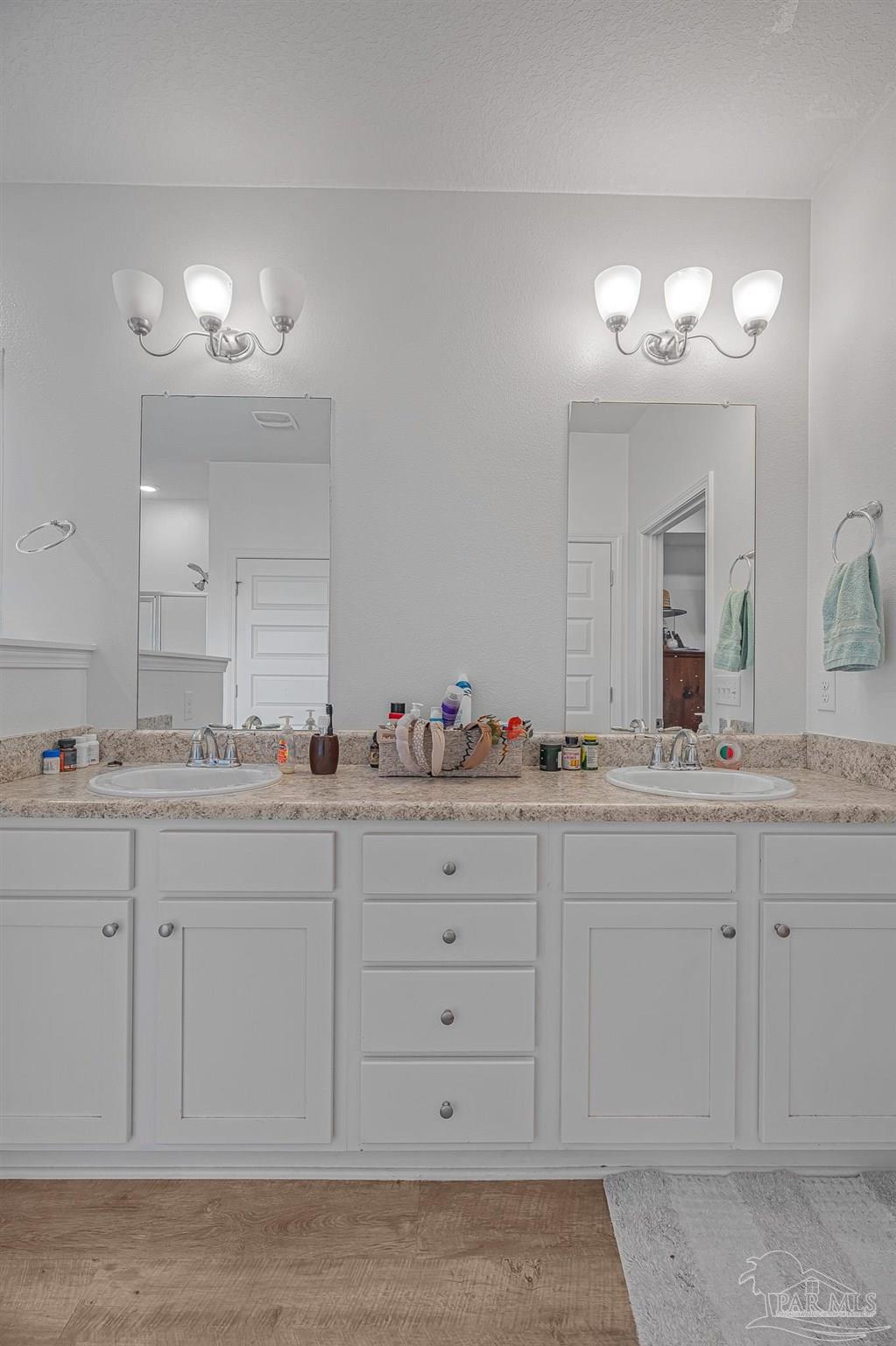 355 Cayden Way Cantonment, FL 32533 - Photo 36 of 61 a bathroom with double sink and a mirror