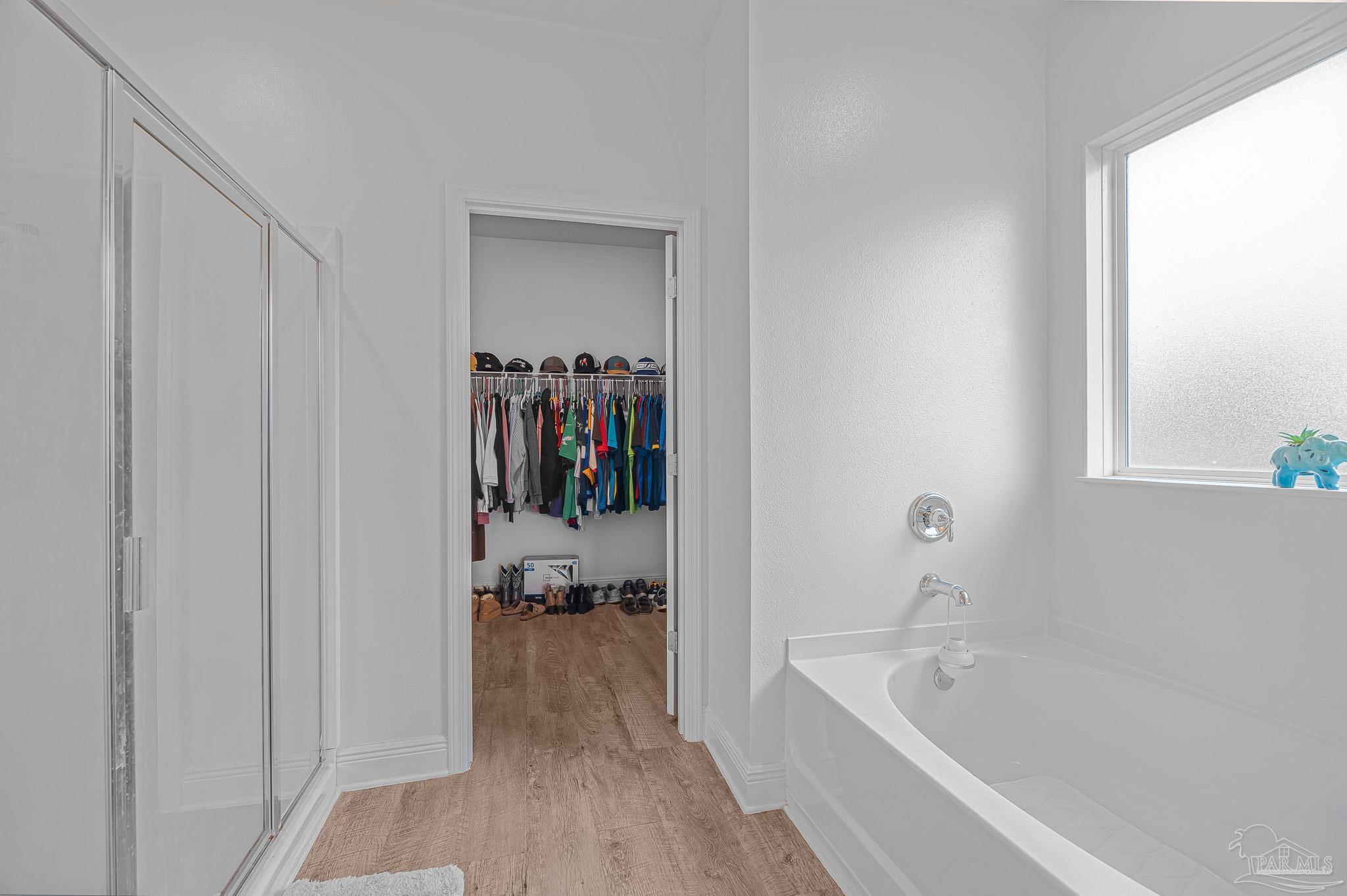 355 Cayden Way Cantonment, FL 32533 - Photo 38 of 61 a bathroom with a tub and a window