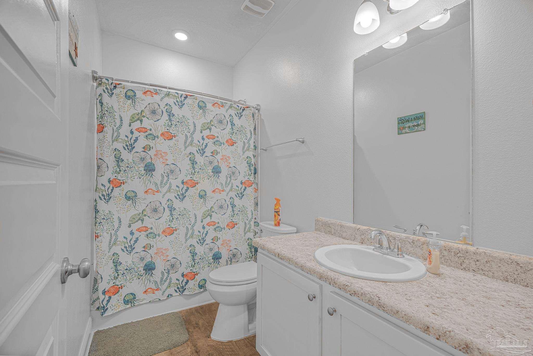 355 Cayden Way Cantonment, FL 32533 - Photo 50 of 61 a bathroom with a granite countertop sink and a mirror