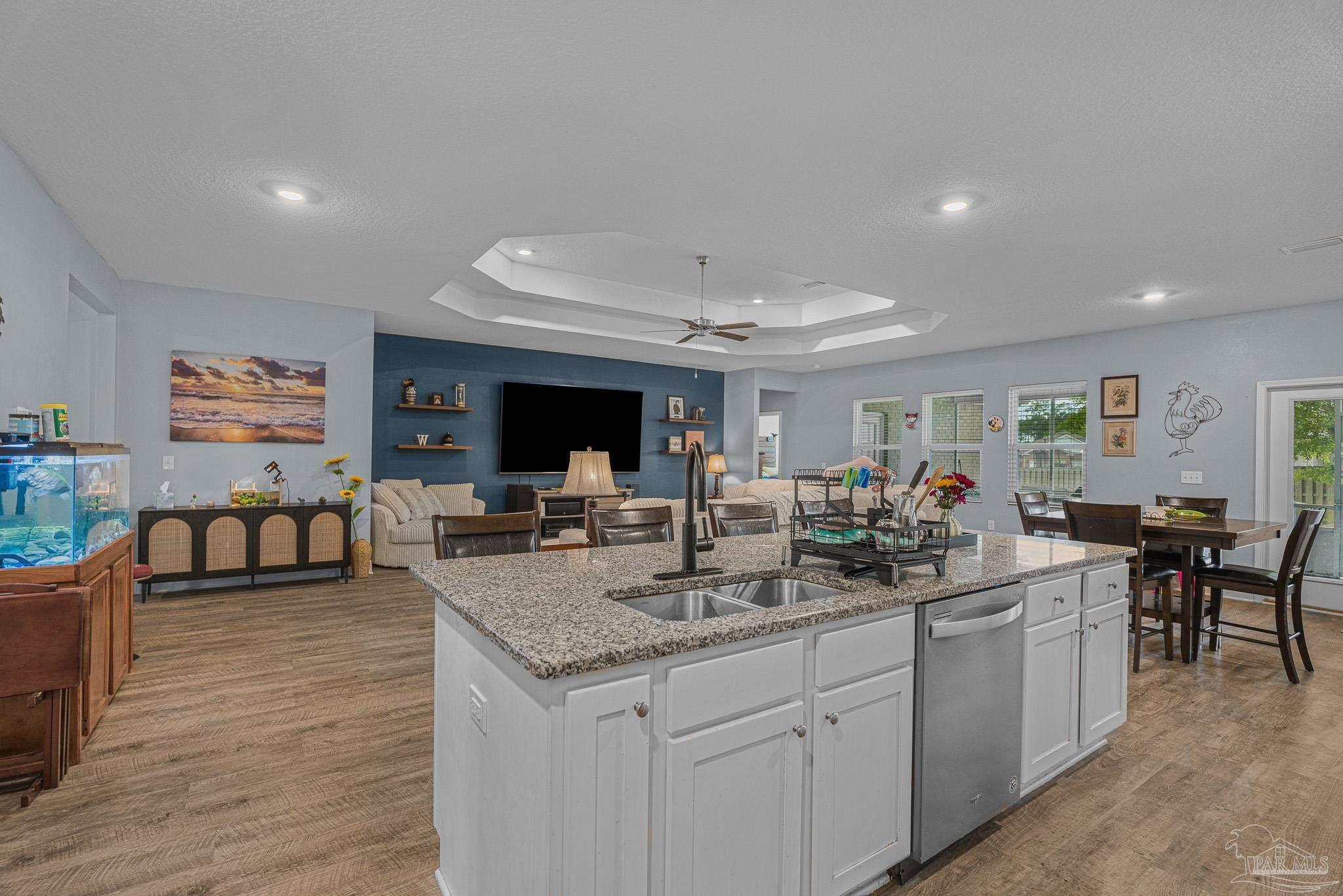355 Cayden Way Cantonment, FL 32533 - Photo 10 of 61 a view of a dining room with furniture and a kitchen