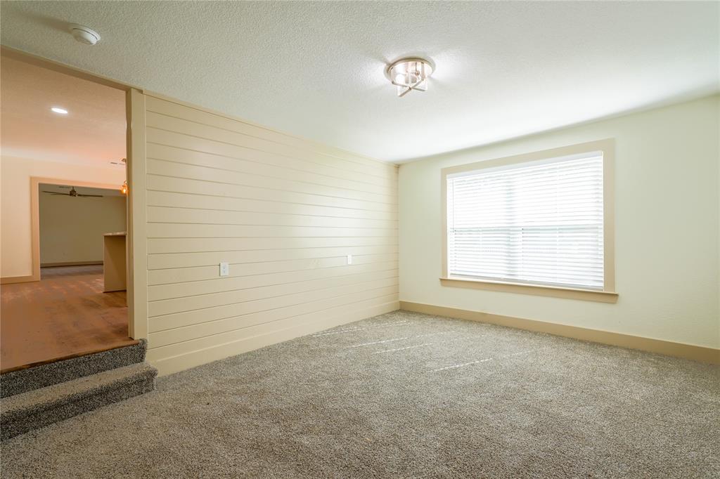 2701 McKenzie Avenue Waco, TX 76708 - Photo 12 of 19 a view of an empty room with a window