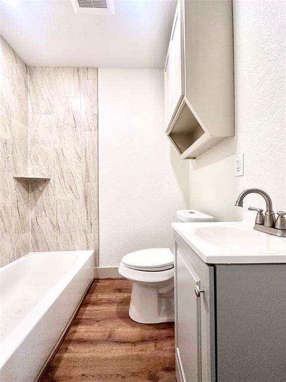 2701 McKenzie Avenue Waco, TX 76708 - Photo 18 of 19 a bathroom with a sink toilet and shower
