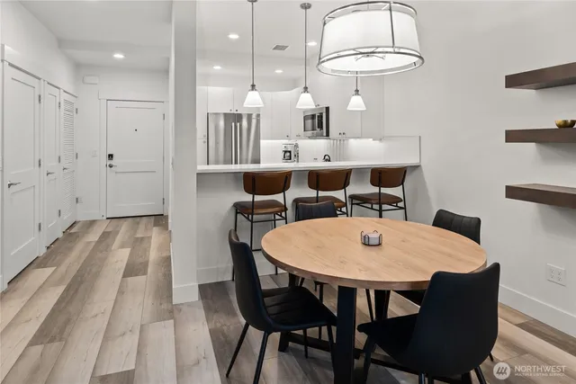 a view of a dining room with furniture