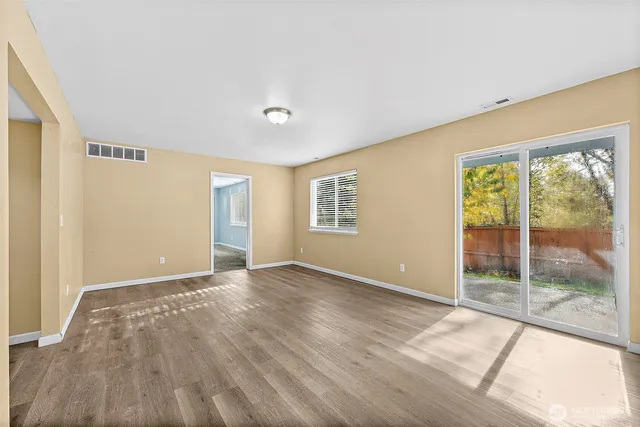 a view of a back yard of the house