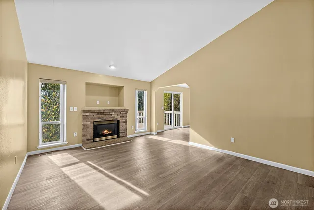 a view of a livingroom with wooden floor