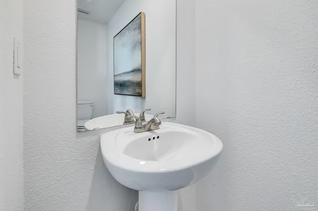 a bathroom with a toilet