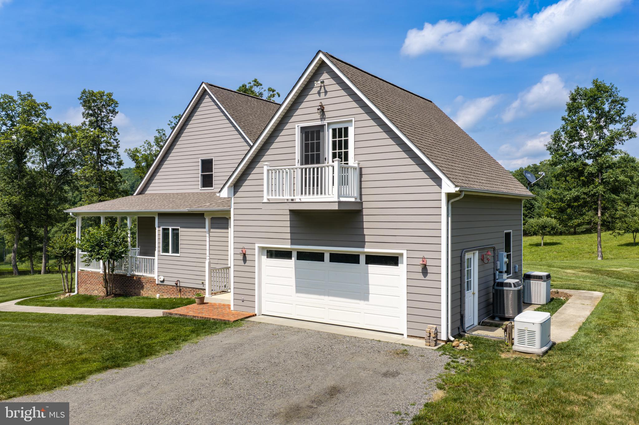 1688 Desert Road Reva, VA 22735 - Photo 48 of 81 a front view of a house with a yard