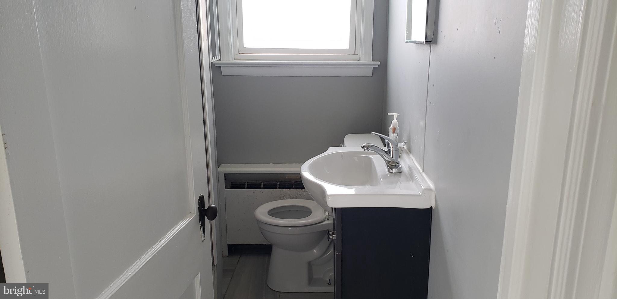 621 North Forklanding Road, Unit B Maple Shade, NJ 08052 - Photo 8 of 12 a bathroom with a sink and a toilet