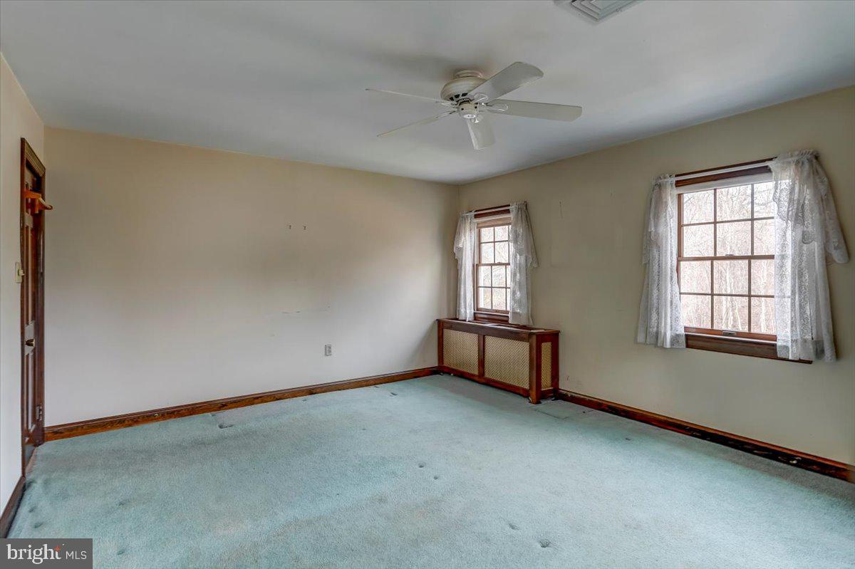 327 North Rolling Road Springfield, PA 19064 - Photo 20 of 34 a view of an empty room with windows