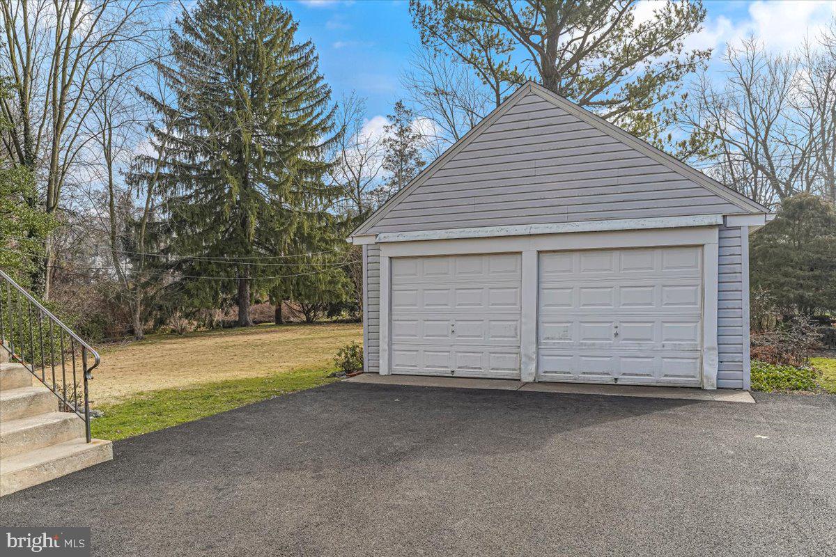 327 North Rolling Road Springfield, PA 19064 - Photo 27 of 34 a view of a house with a garage