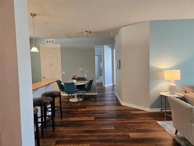 a workspace with furniture and wooden floor