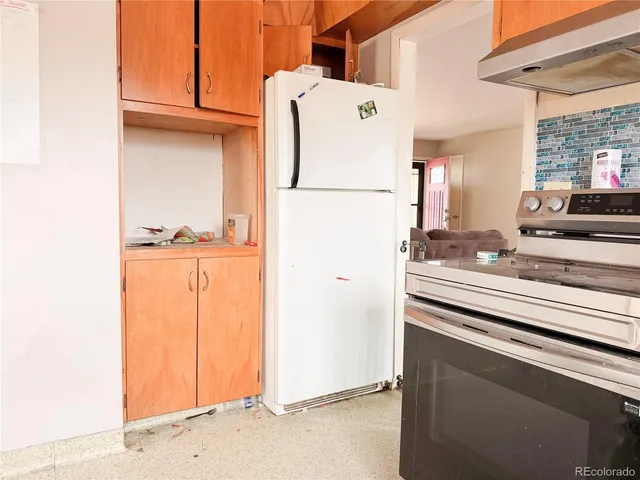 a view of hallway with washer and dryer