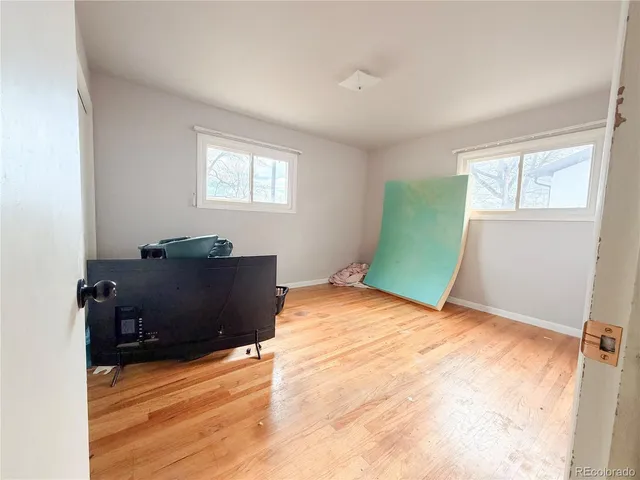 a view of a room with window closet and windows