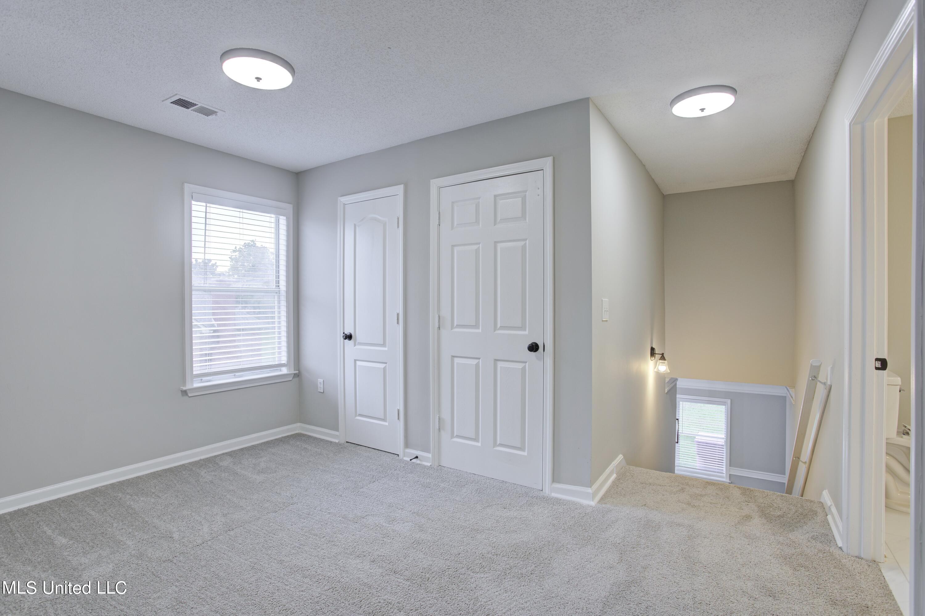 7678 State Line Road Olive Branch, MS 38654 - Photo 18 of 50 stairs closet area 1b