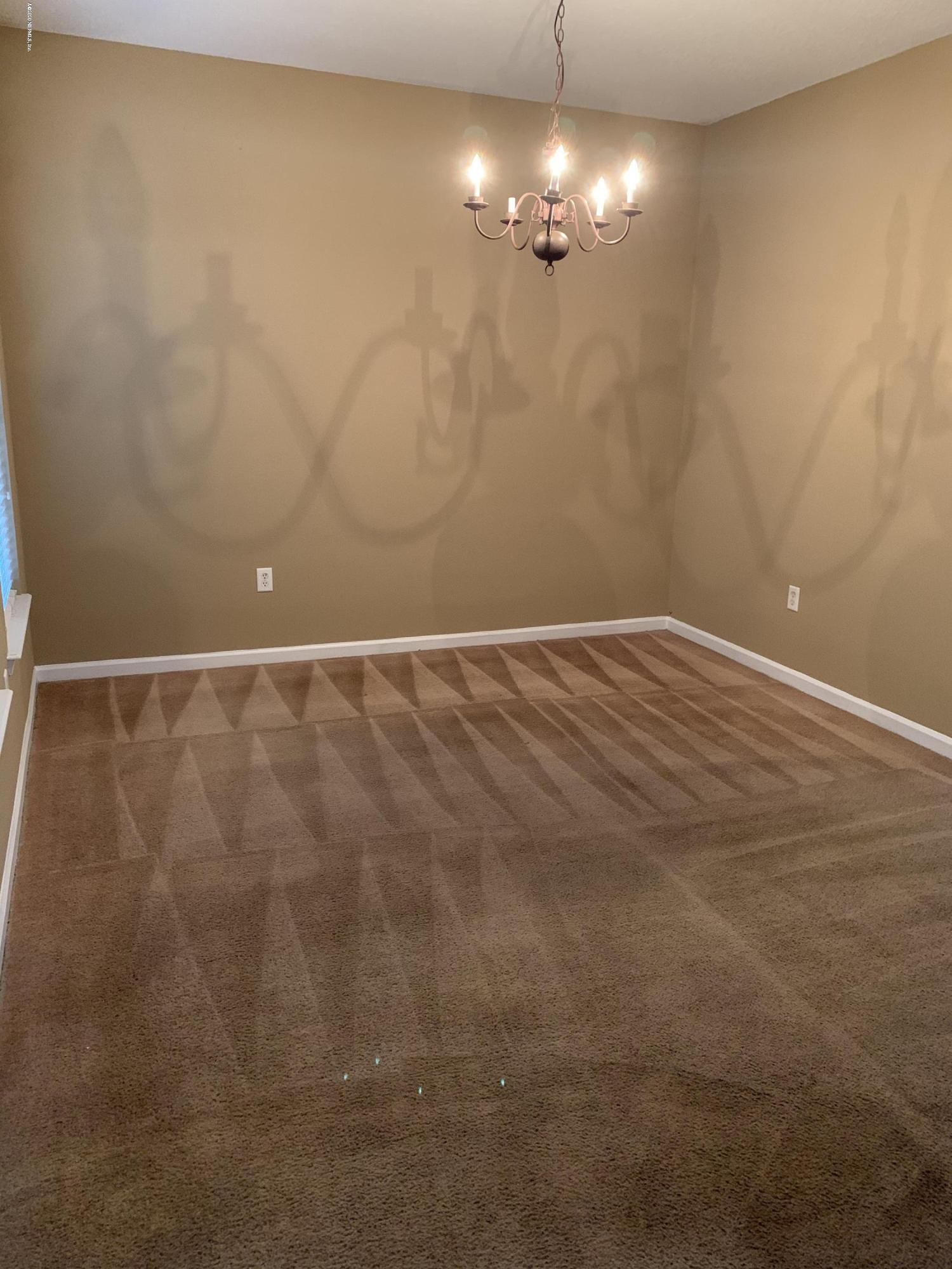 7140 Rampart Ridge Circle West Jacksonville, FL 32244 - Photo 9 of 13 a view of an empty room