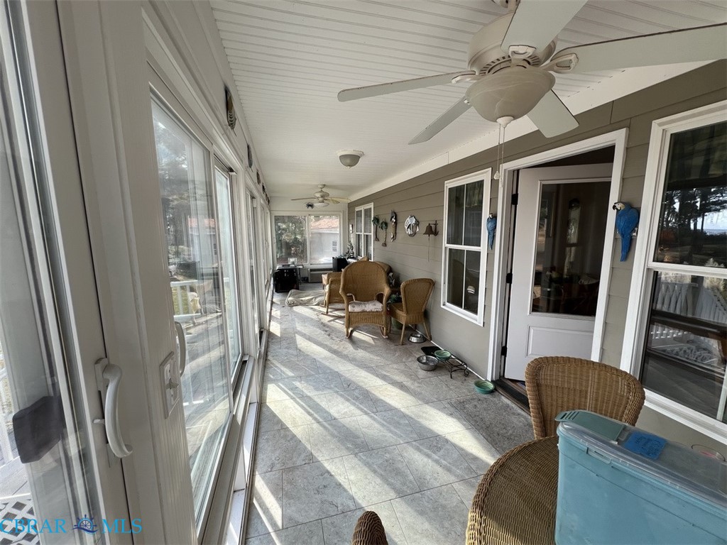 301 Gillim Road Deltaville, VA 23043 - Photo 15 of 31 Sunroom with a ceiling fan