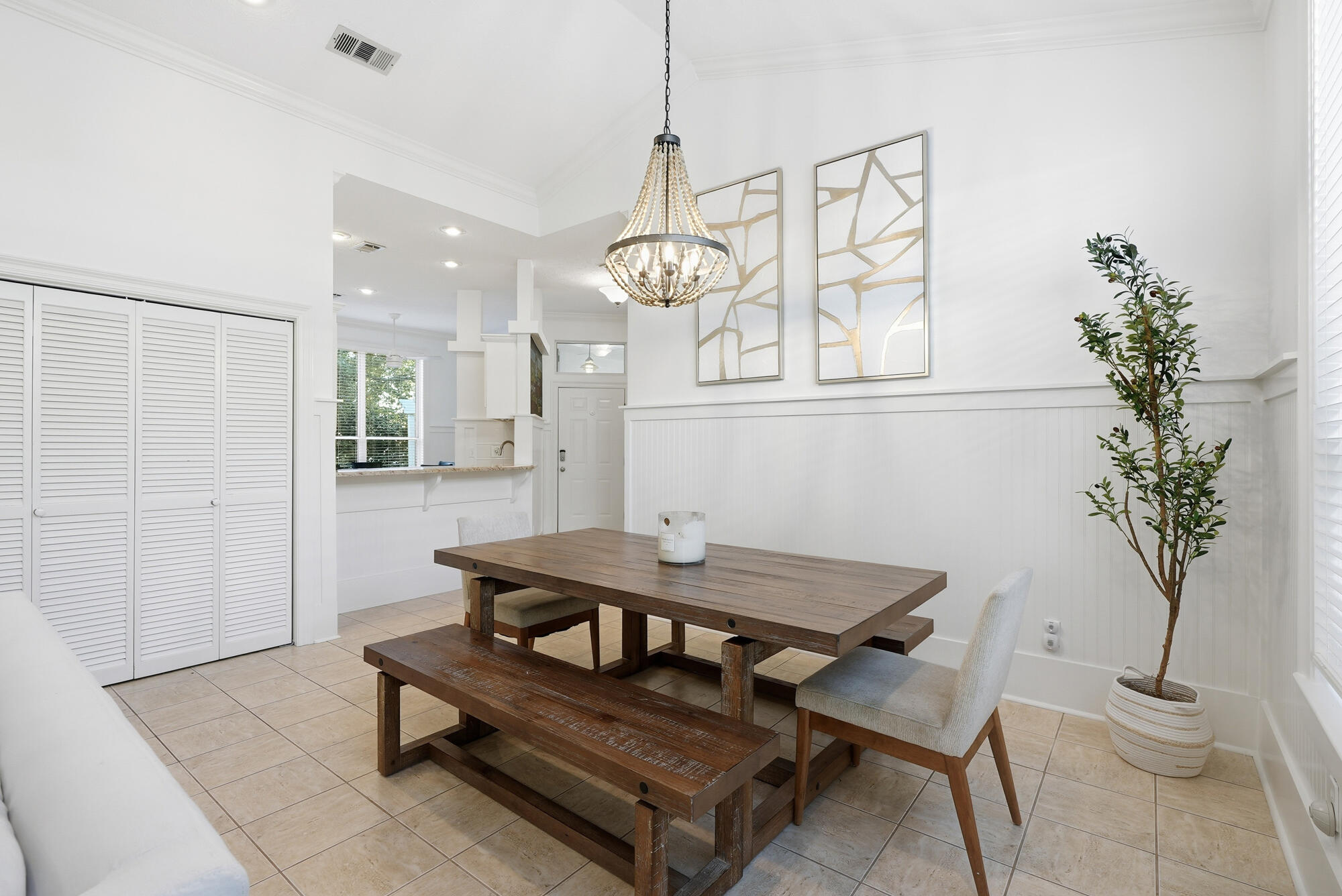 128 Seabreeze Boulevard Inlet Beach, FL 32461 - Photo 11 of 54 a view of a dining room with furniture and a chandelier