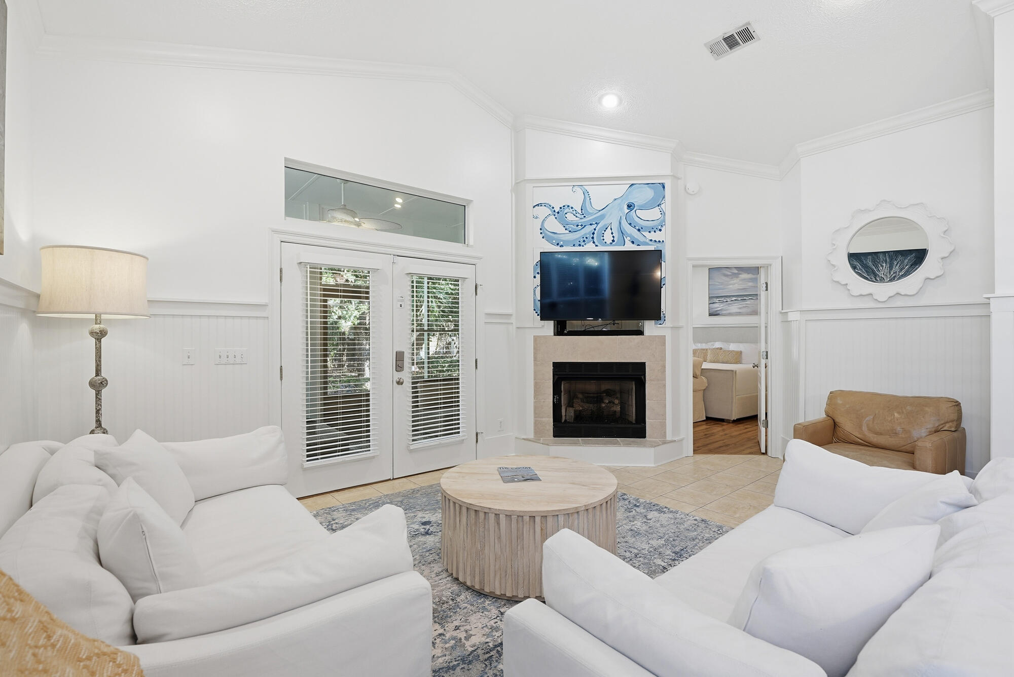 128 Seabreeze Boulevard Inlet Beach, FL 32461 - Photo 13 of 54 a living room with furniture and a fireplace