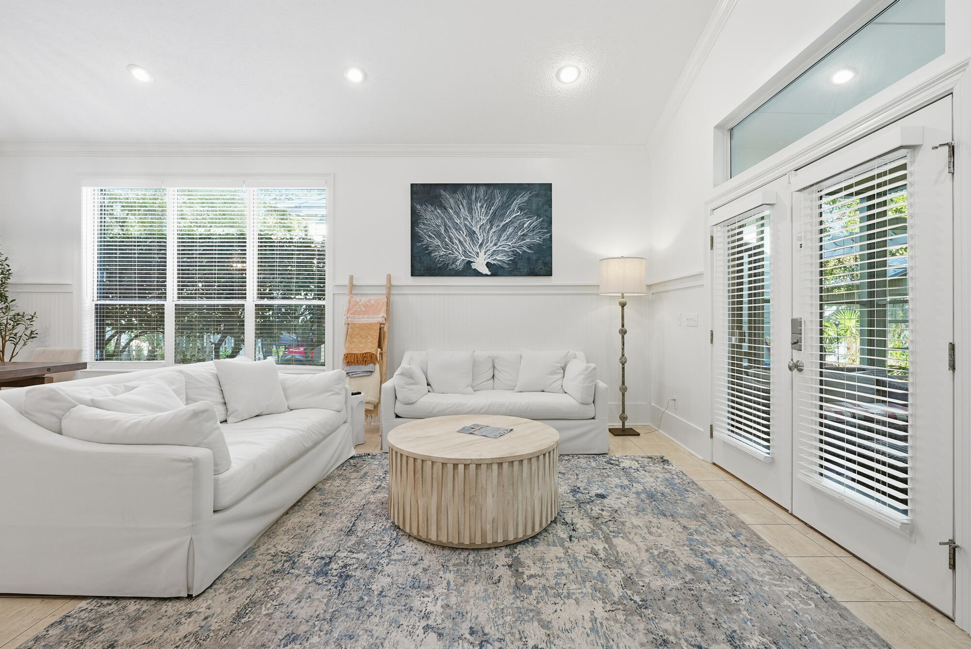 128 Seabreeze Boulevard Inlet Beach, FL 32461 - Photo 14 of 54 a living room with furniture and a large window