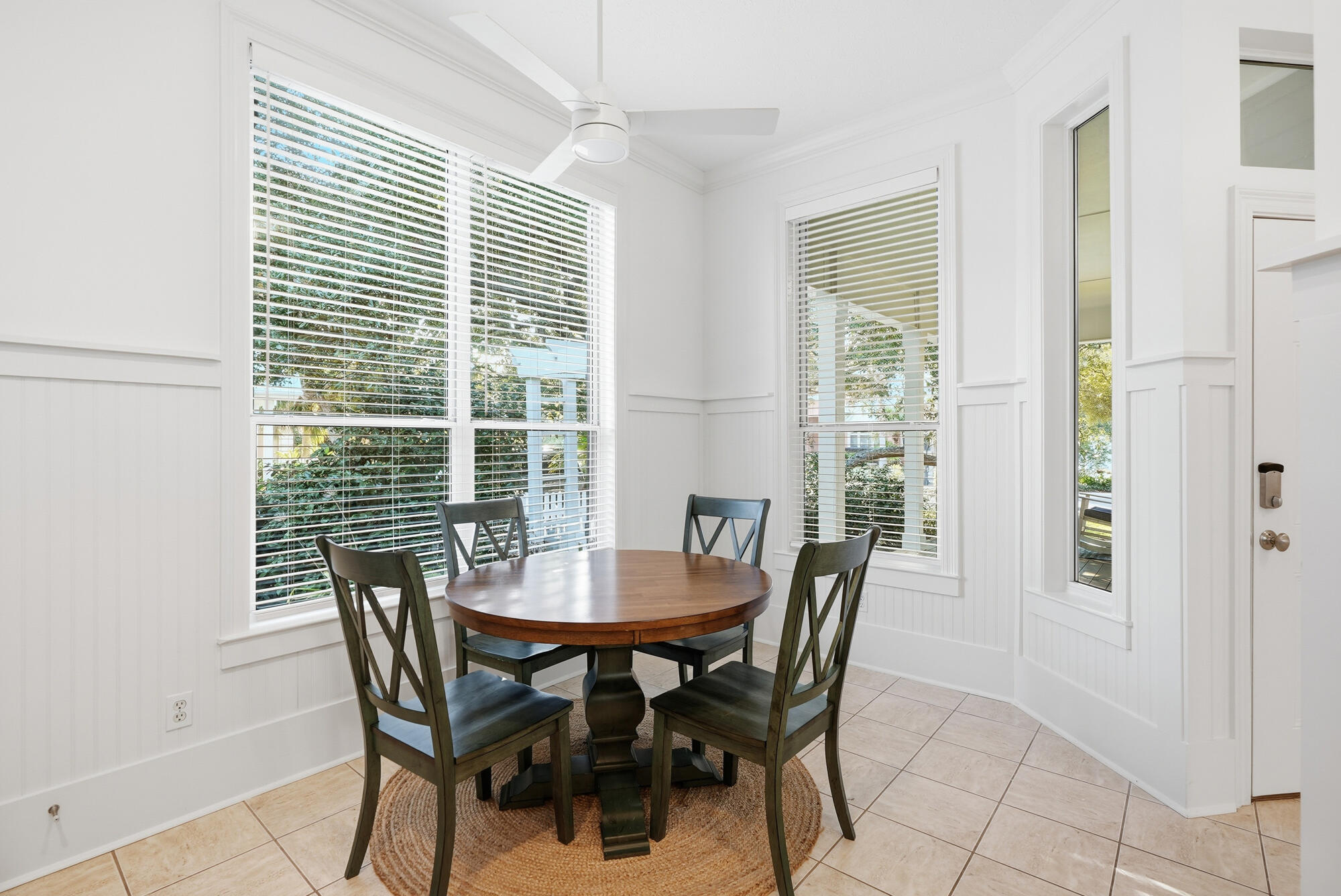 128 Seabreeze Boulevard Inlet Beach, FL 32461 - Photo 20 of 54 a view of a dining room with furniture and windows