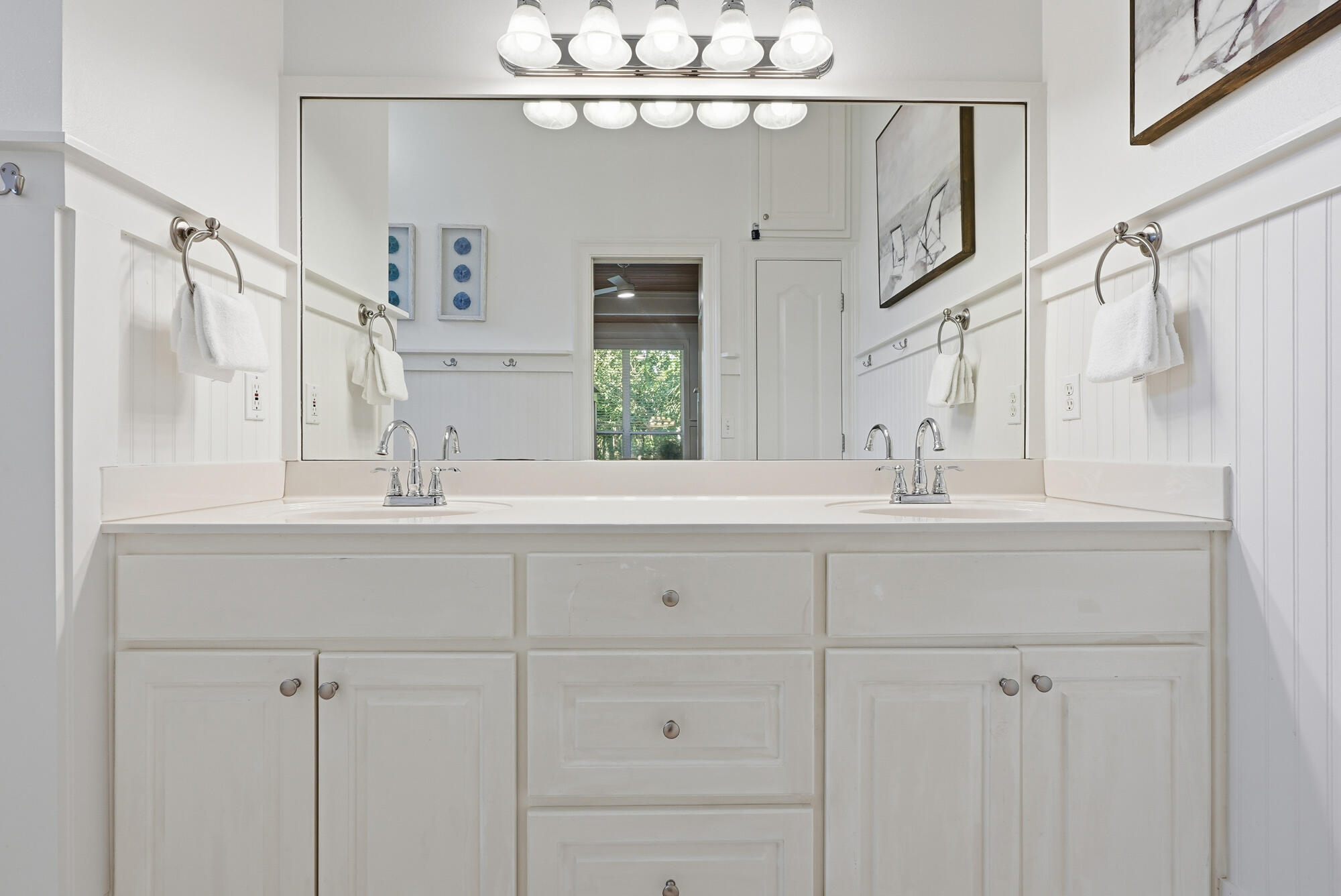 128 Seabreeze Boulevard Inlet Beach, FL 32461 - Photo 24 of 54 a bathroom with double vanity sink a vanity and mirrors