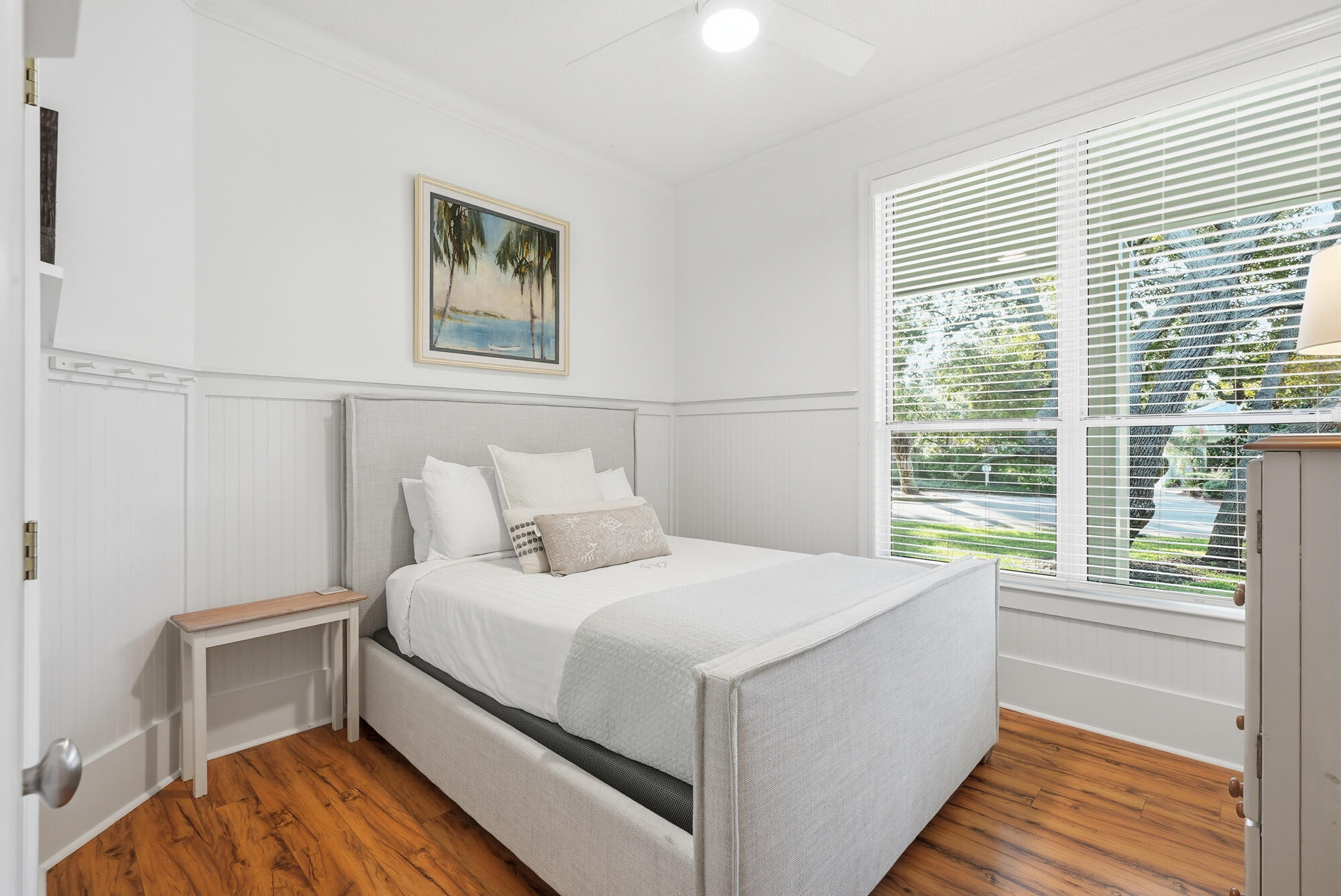 128 Seabreeze Boulevard Inlet Beach, FL 32461 - Photo 26 of 54 a bedroom with a bed and a large window