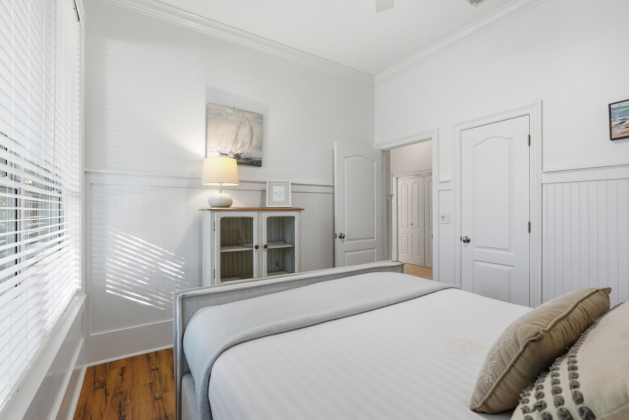 128 Seabreeze Boulevard Inlet Beach, FL 32461 - Photo 27 of 54 a bedroom with a bed and a large window