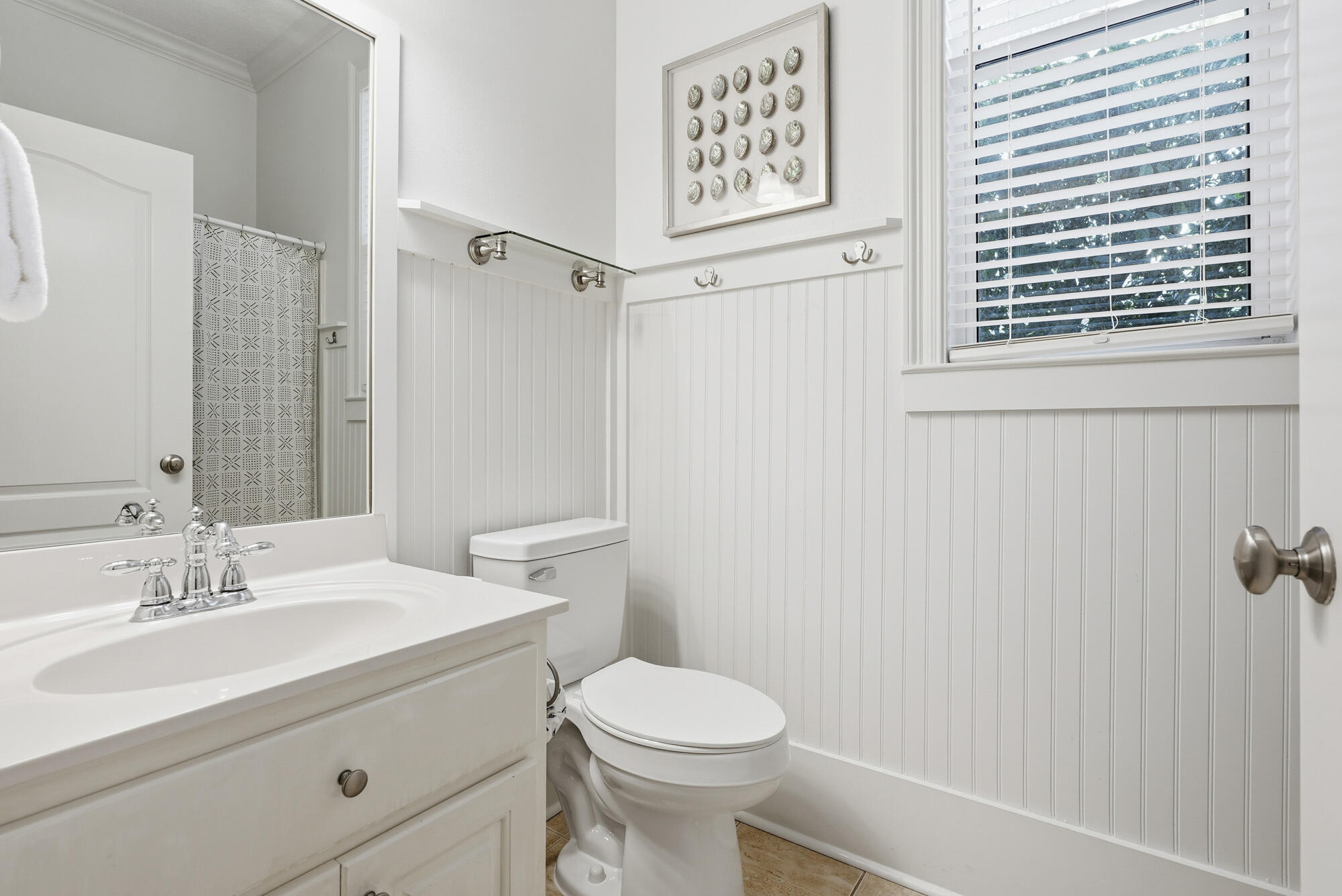 128 Seabreeze Boulevard Inlet Beach, FL 32461 - Photo 32 of 54 a bathroom with a sink a toilet and shower