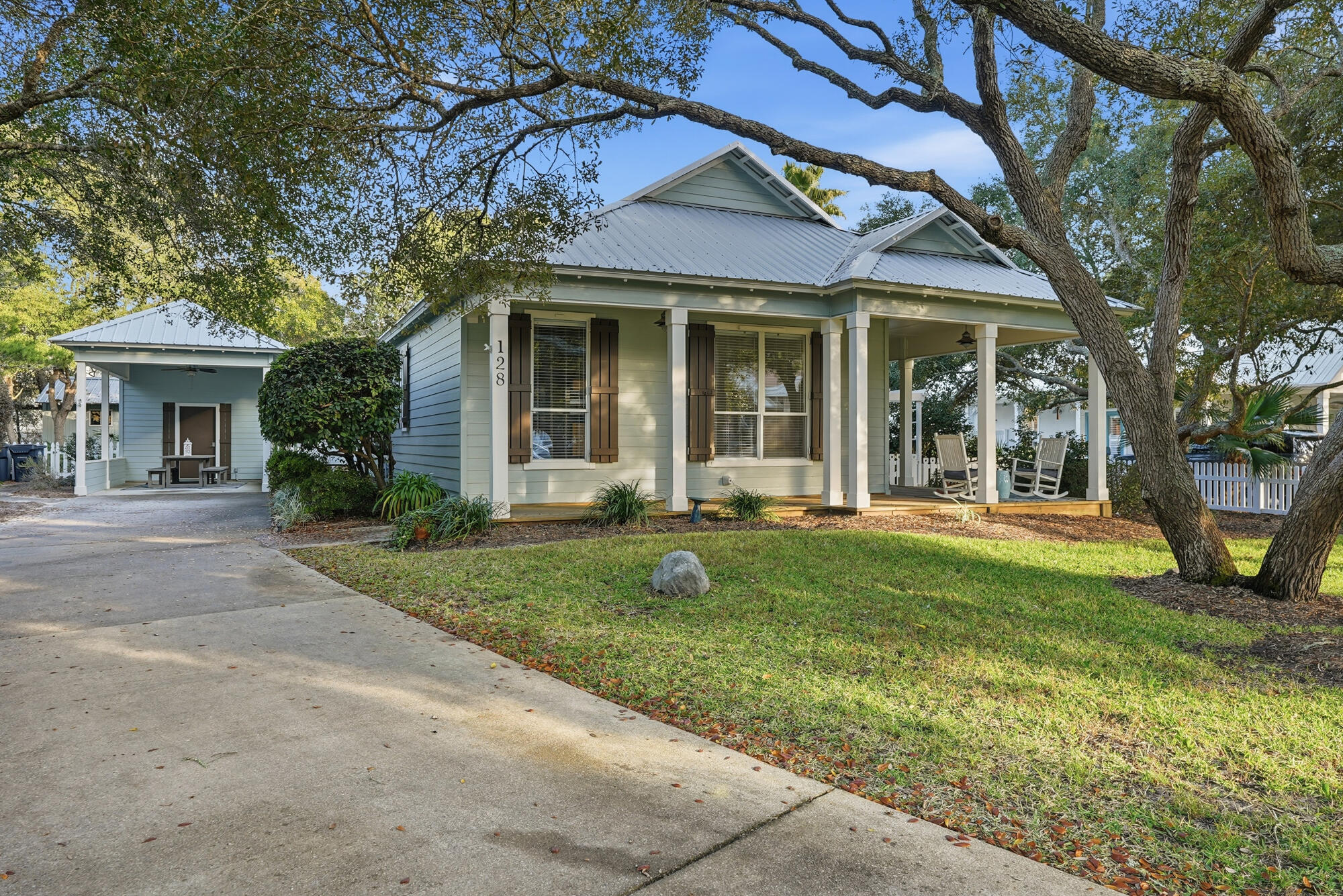 128 Seabreeze Boulevard Inlet Beach, FL 32461 - Photo 44 of 54 front view of a house with a yard