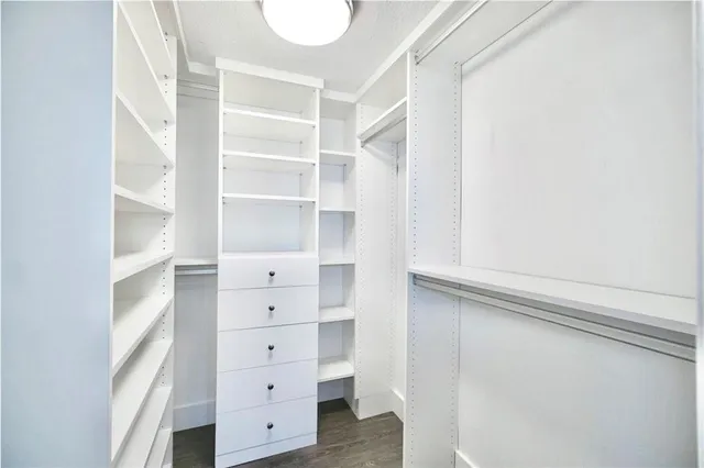 a view of an empty walk in closet