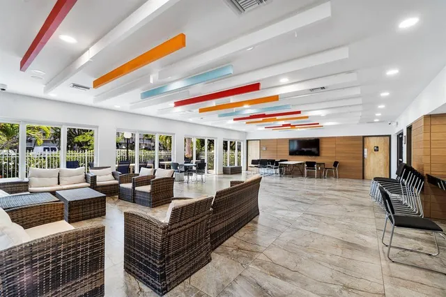 a view of a swimming pool with a lounge chairs