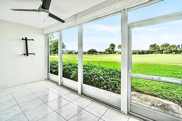 a view of a room with a large window