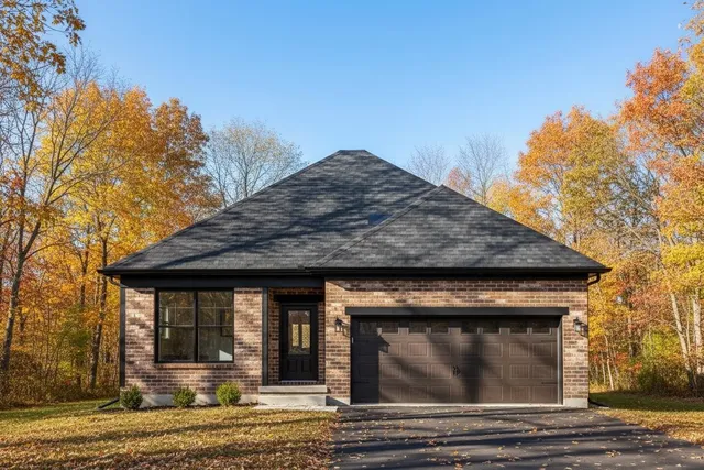 a view of a house with large windows