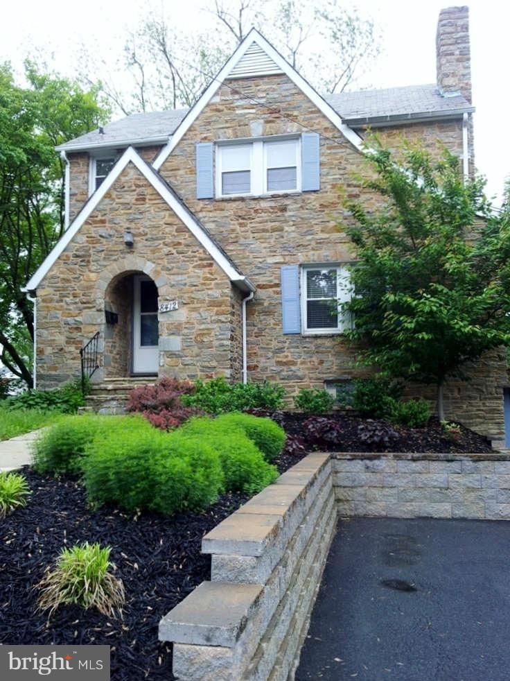 8412 Old Harford Road Baltimore, MD 21234 - Photo 1 of 25 a front view of house with yard and green space