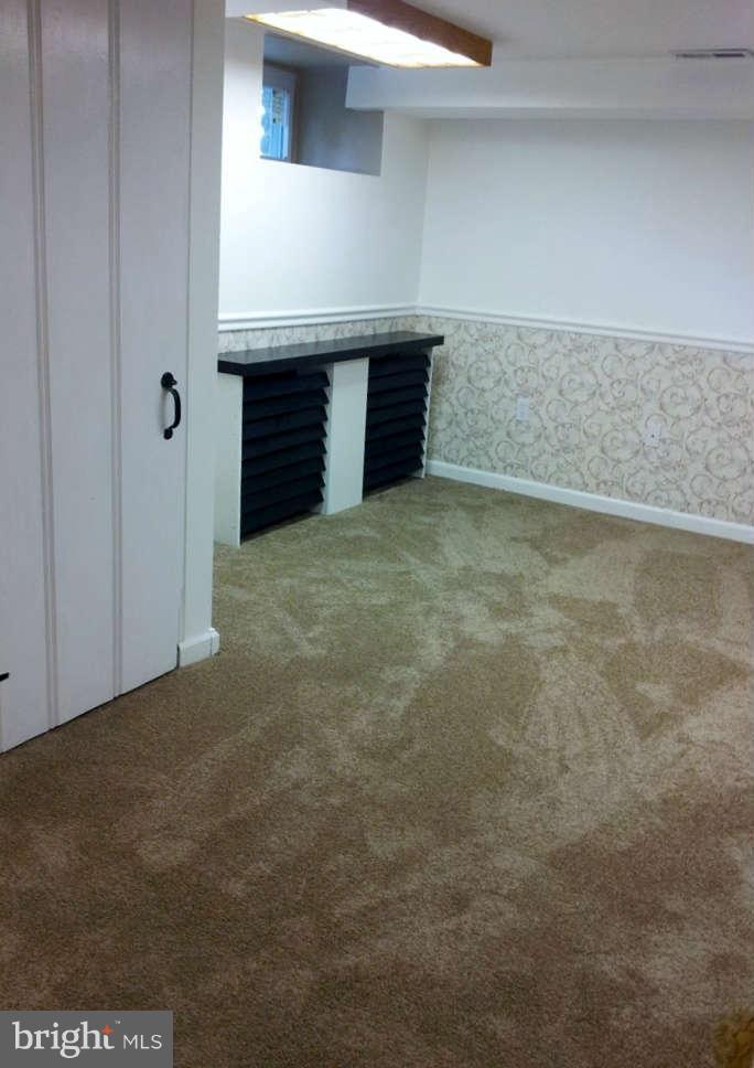 8412 Old Harford Road Baltimore, MD 21234 - Photo 22 of 25 a view of an empty room with cabinet