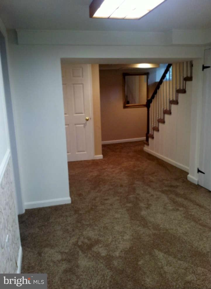 8412 Old Harford Road Baltimore, MD 21234 - Photo 23 of 25 a view of an empty room with stairs