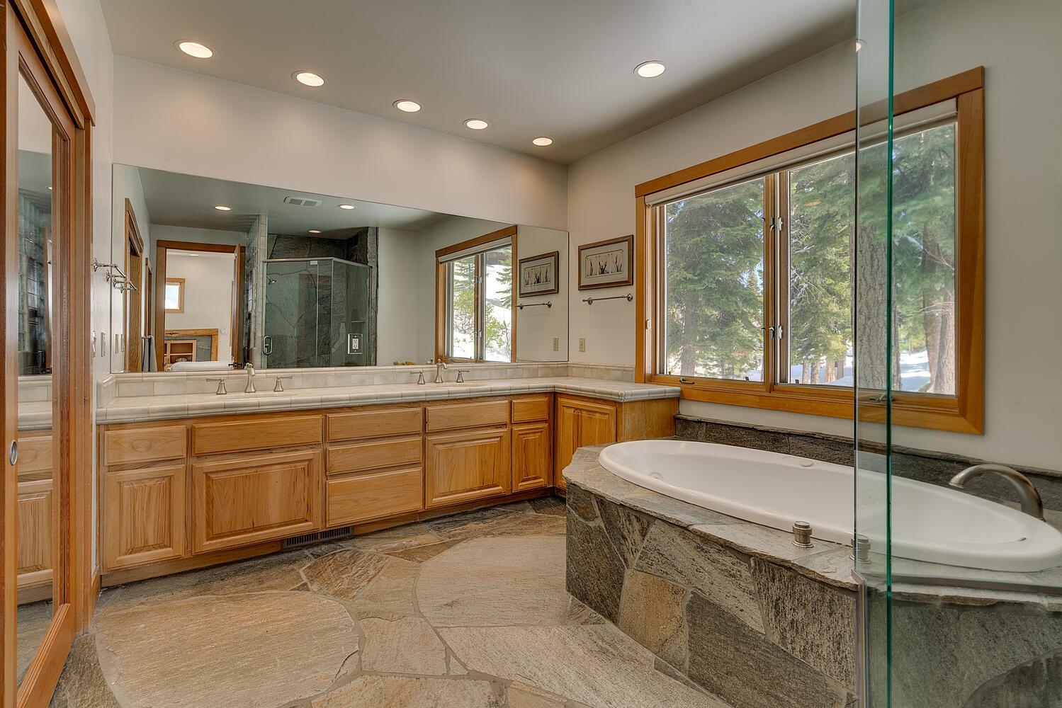 1809 Woods Point Way Northstar, CA 96161 - Photo 17 of 28 a large bathroom with a large tub and sink