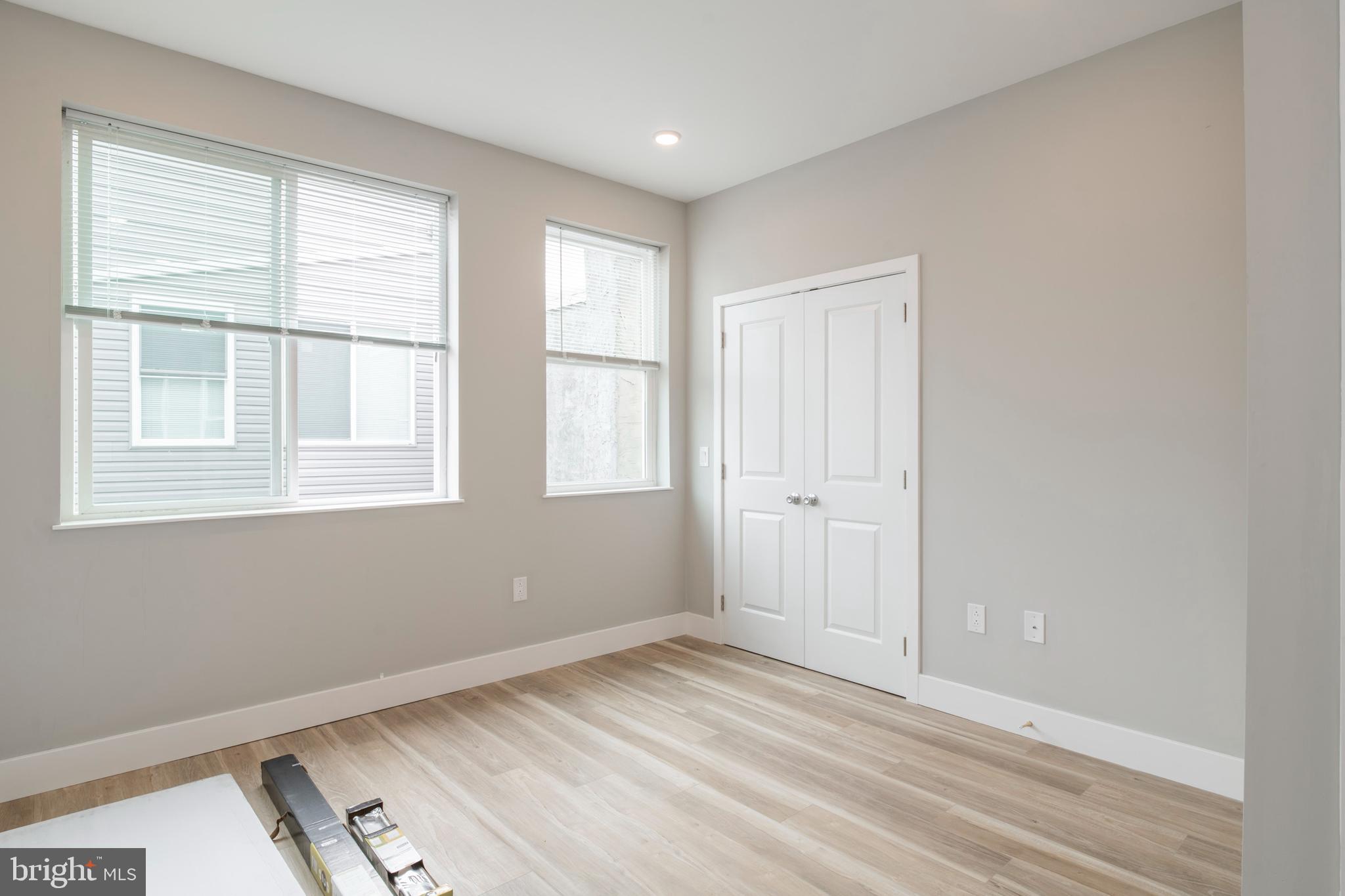 2009 North Darien Street, Unit 2 Philadelphia, PA 19122 - Photo 14 of 22 a view of empty room with wooden floor and fan