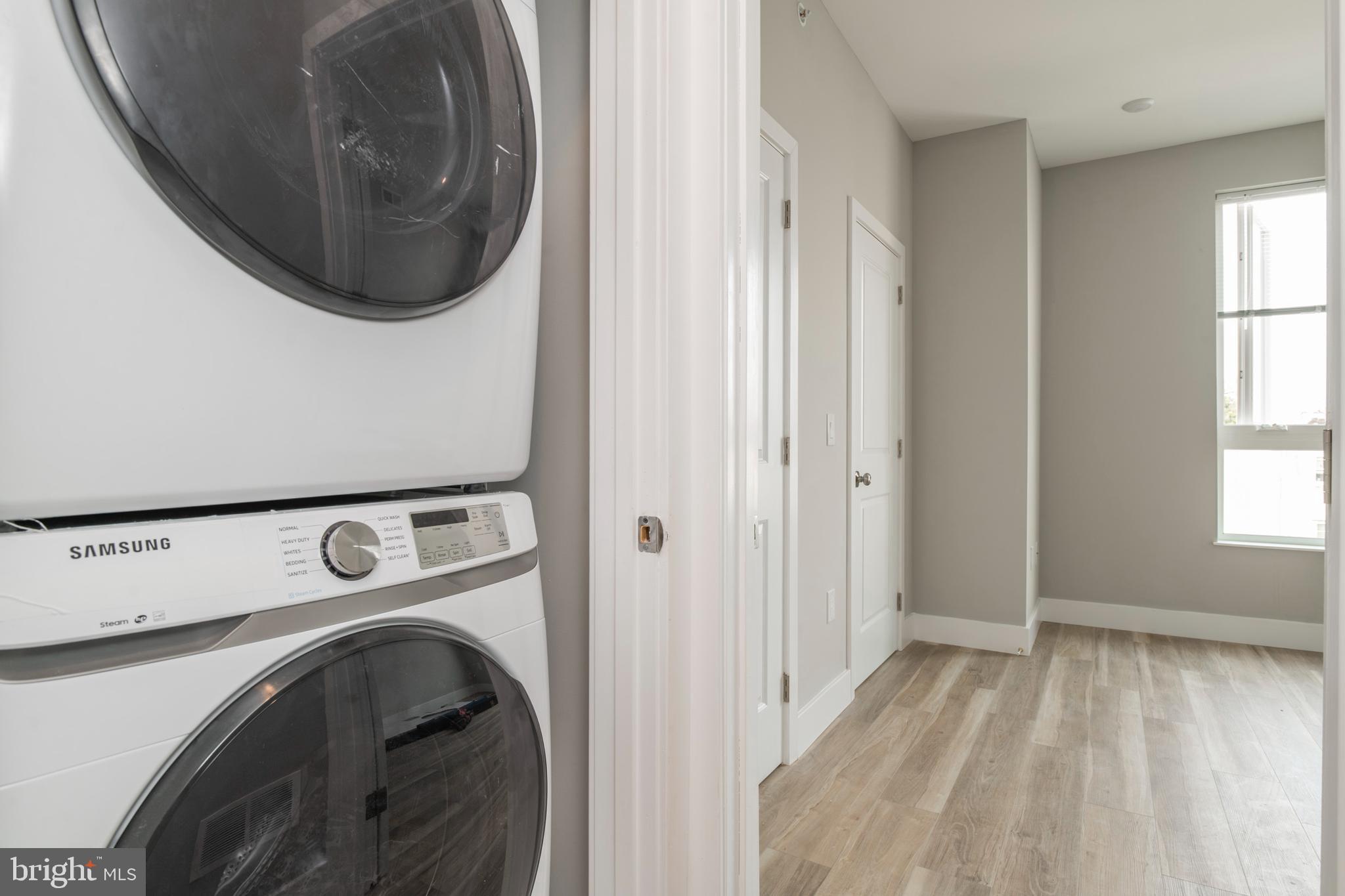 2009 North Darien Street, Unit 2 Philadelphia, PA 19122 - Photo 21 of 22 a utility room with dryer and washer