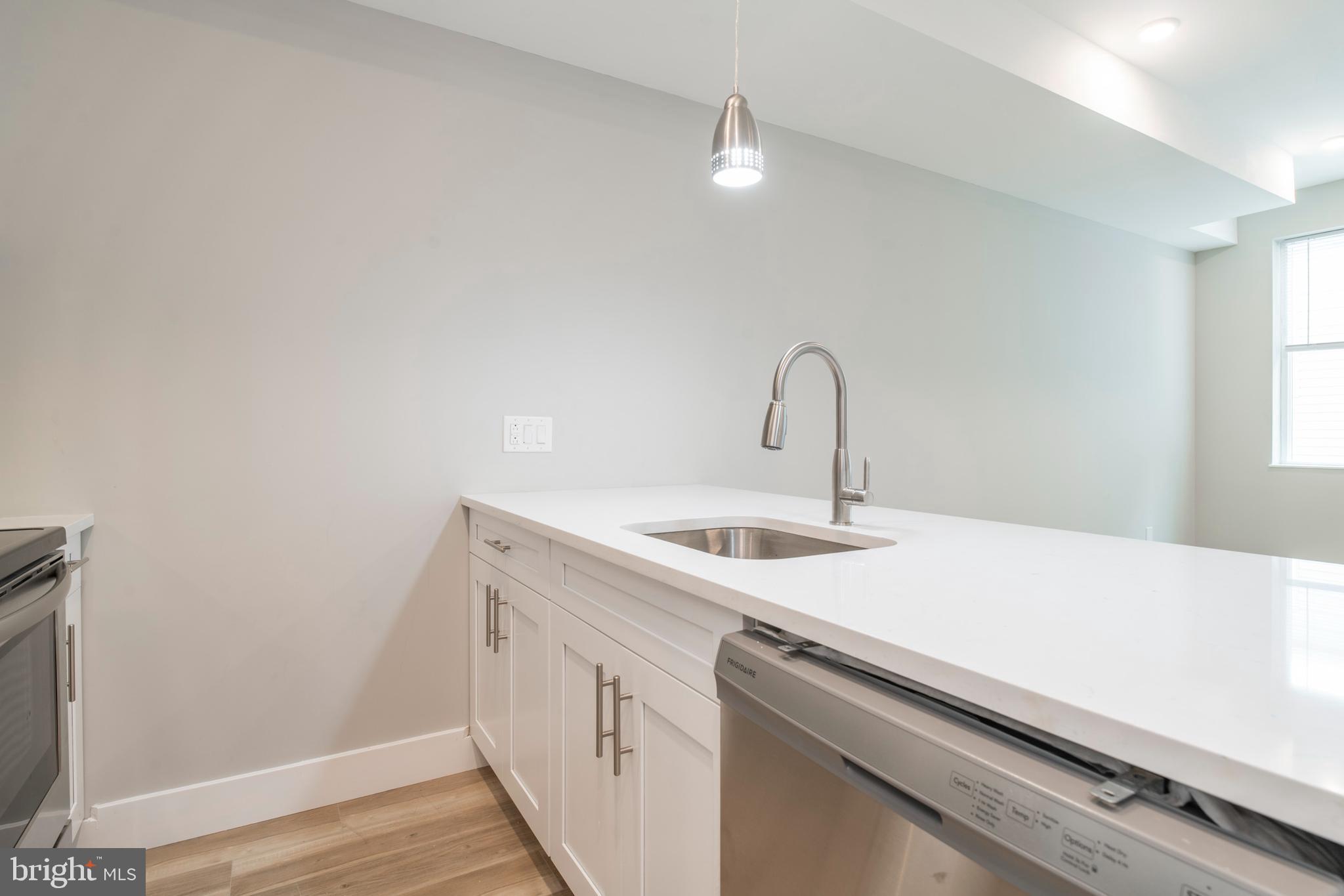 2009 North Darien Street, Unit 2 Philadelphia, PA 19122 - Photo 6 of 22 a close view of sink and tap