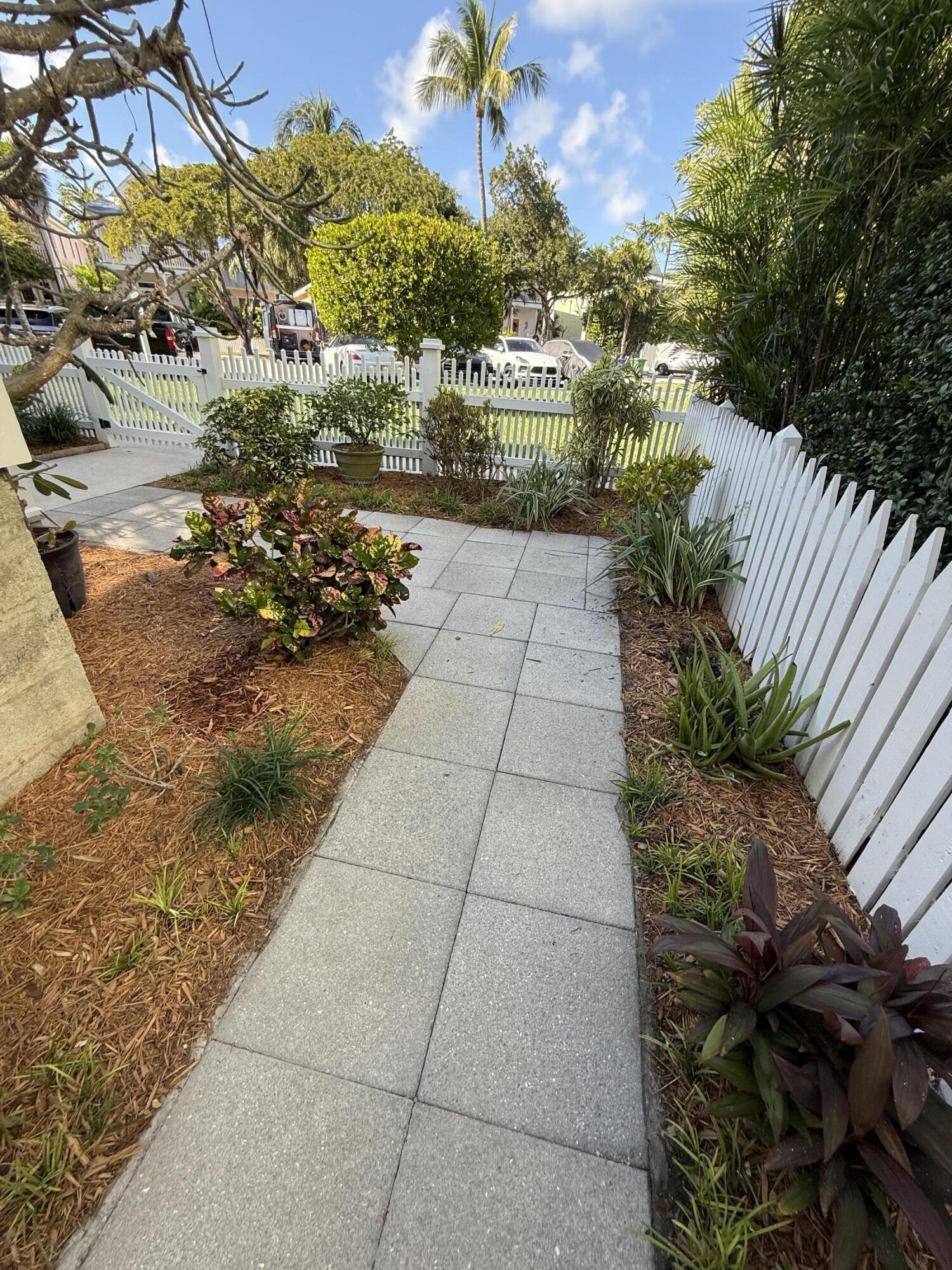 53 Spoonbill Way Key West, FL 33040 - Photo 27 of 32 a view of a pathway with a yard