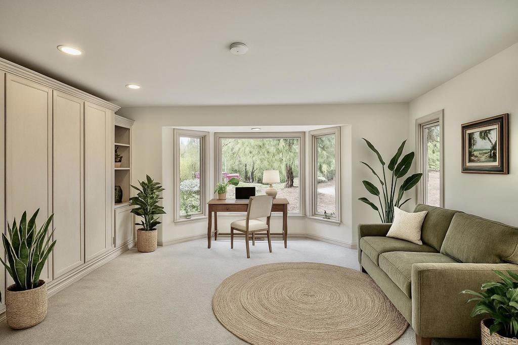 145 Yucca Road Fallbrook, CA 92028 - Photo 32 of 58 a living room with furniture potted plant and a large window