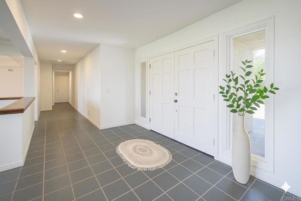 145 Yucca Road Fallbrook, CA 92028 - Photo 8 of 58 a view of a room with a potted plant